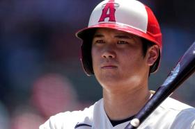 Shohei Ohtani agreed Saturday to a record $700 million, 10-year contract with the Los Angeles Dodgers.