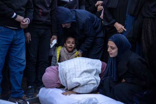 Palestinians mourn their relatives killed in the Israeli bombardment of the Gaza Strip, in the hospital in Khan Younis, Tuesday, Nov. 21, 2023. (AP Photo/Fatima Shbair)