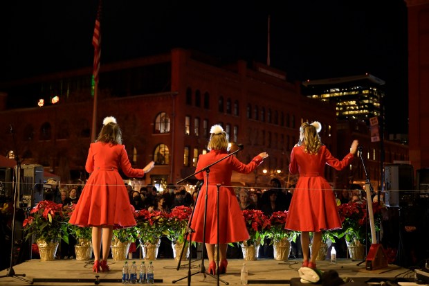 DENVER, CO - NOVEMBER 26: The Denver Dolls sing holiday favorites prior to the illumination of the tree during the 2021 Grand Illumination event at Union Station on Friday November 26, 2021. (Photo by Eric Lutzens/The Denver Post)