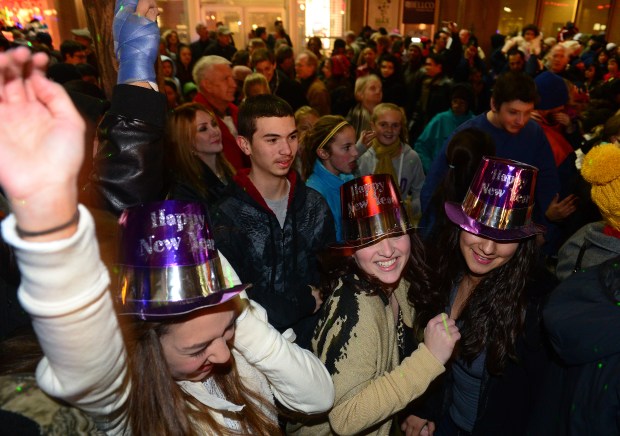 DENVER, CO - DECEMBER 30, 2013: Thousands of people enjoyed music and watched an early fireworks show on the 16th Street Mall in Denver, Co on December 31, 2013. (Photo By Helen H. Richardson/ The Denver Post)